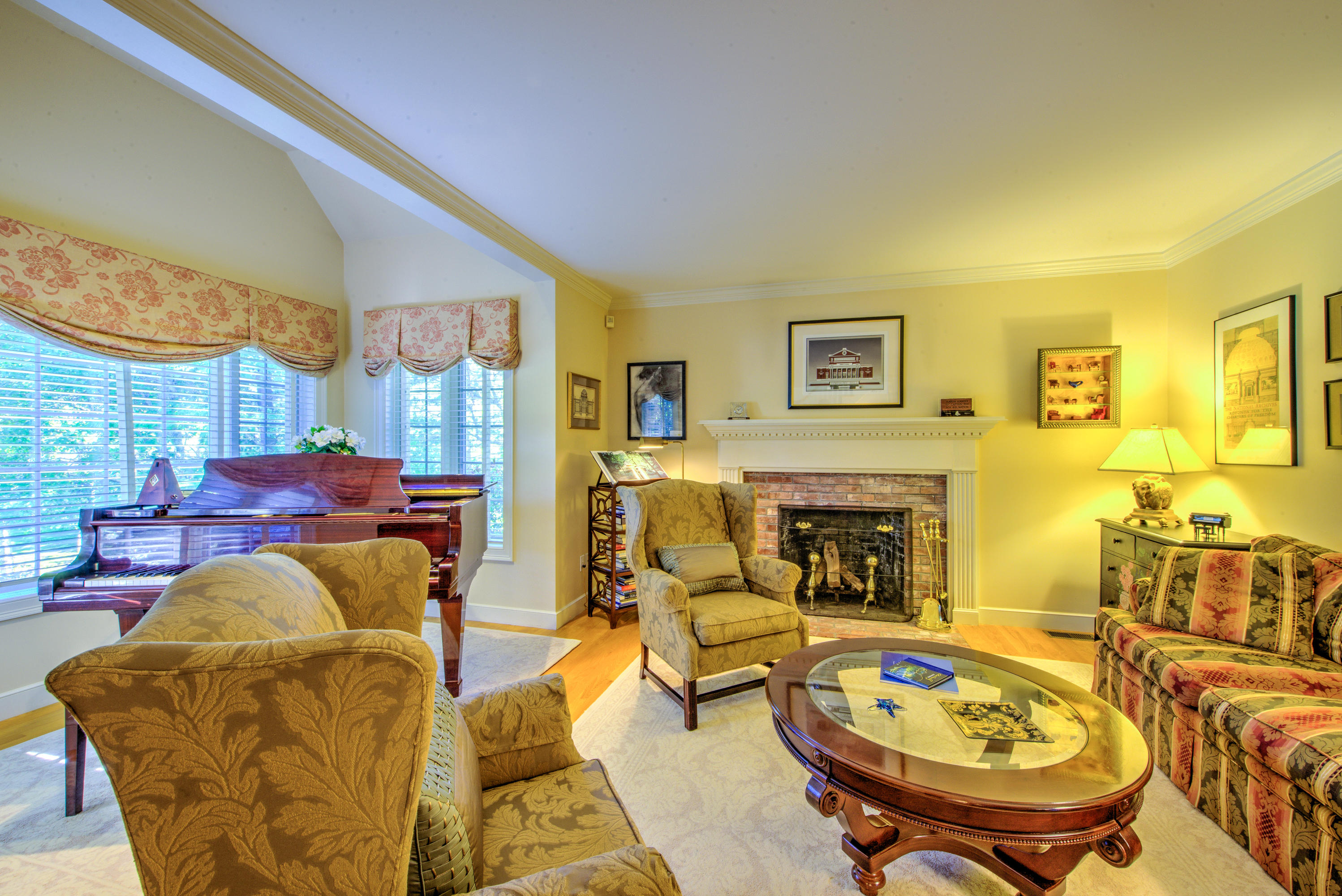 48 Crystal Ridge Road Marstons Mills, MA 02648 - Photo 4 of 26 a living room with furniture and a fireplace