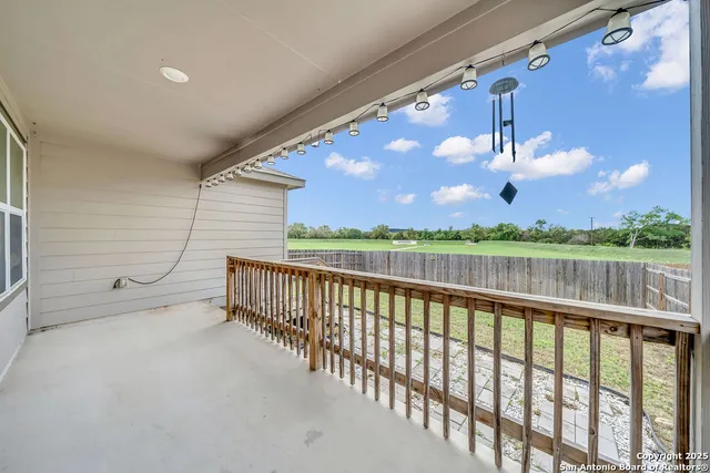 a view of a porch with a yard