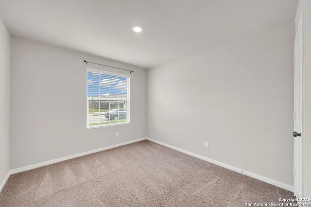 a bathroom with a granite countertop sink a toilet and bathtub