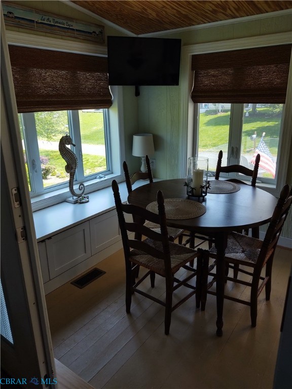 777 Marsh Pungo Road Locust Hill, VA 23092 - Photo 30 of 46 Dining space with wooden walls