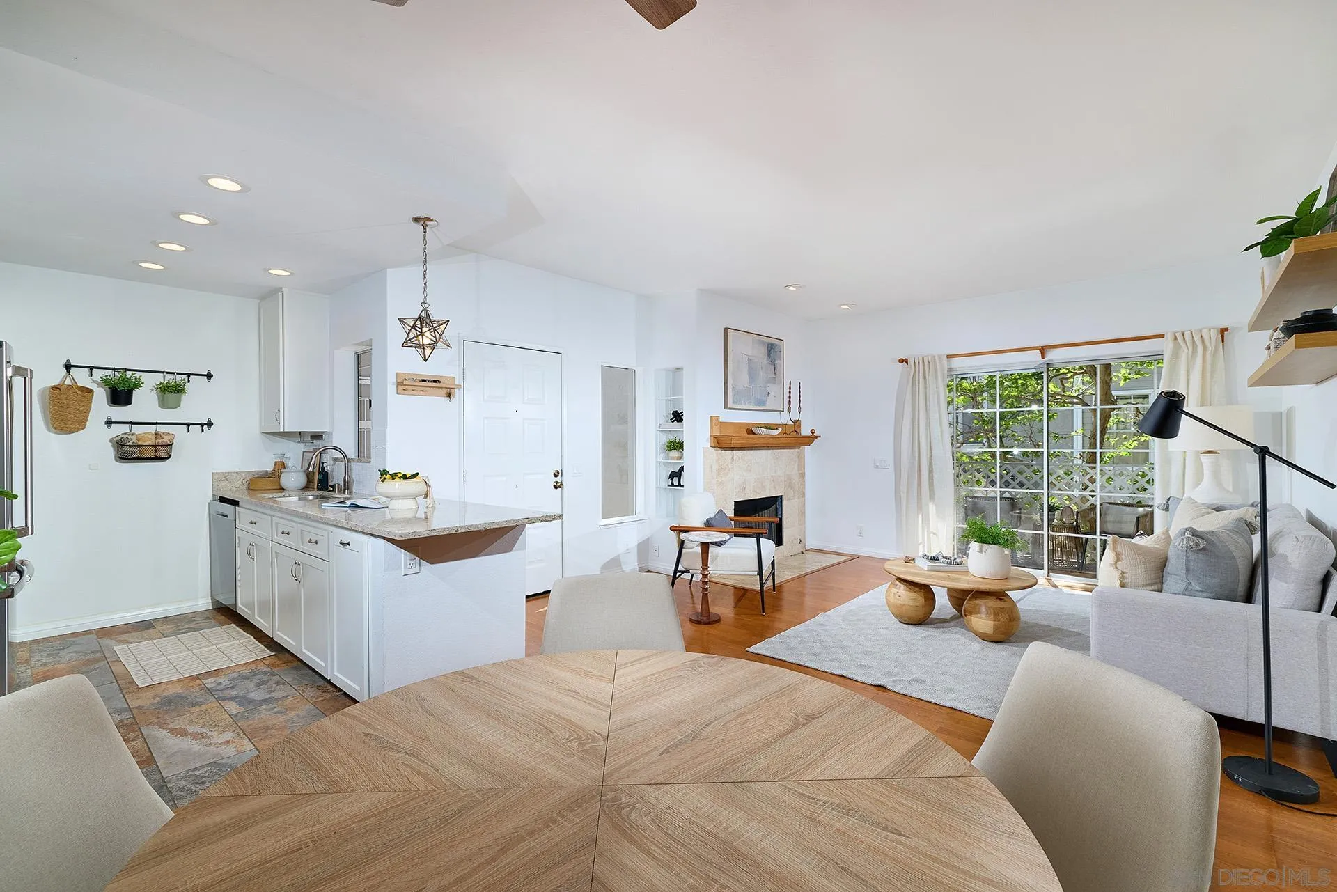 13826 Midland Road Poway, CA 92064 - Photo 1 of 38 a large white kitchen with a large window