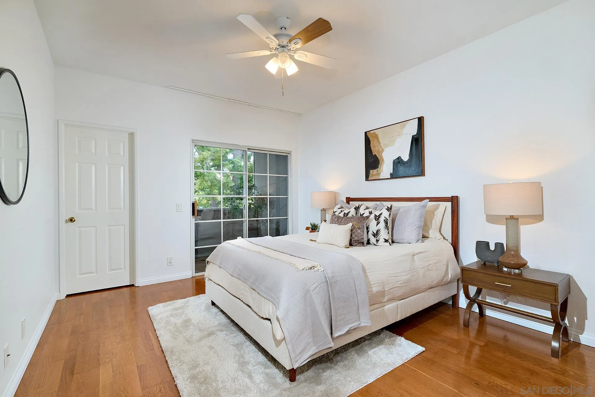 13826 Midland Road Poway, CA 92064 - Photo 12 of 38 a bedroom with a bed and a lamp on table