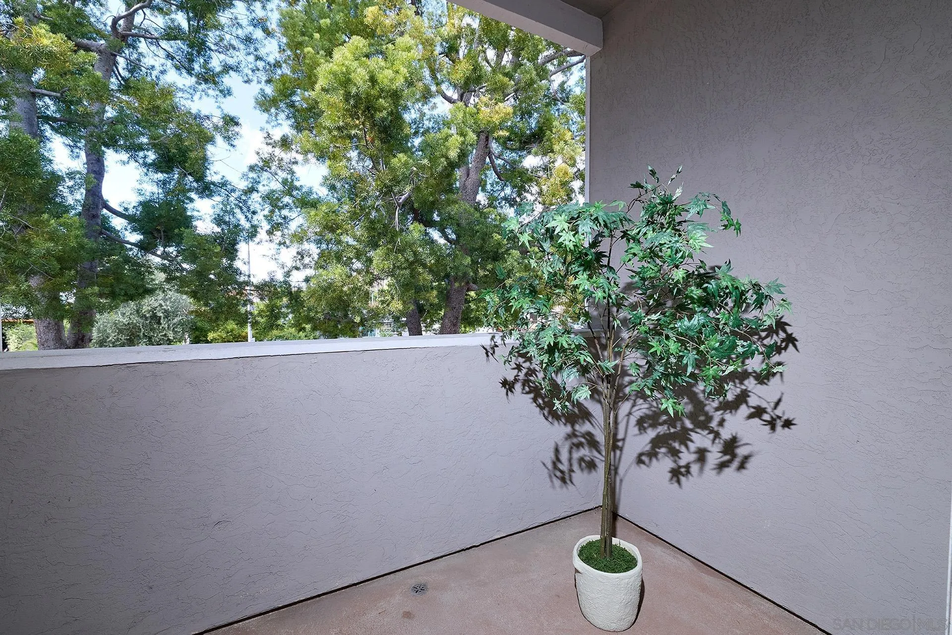 13826 Midland Road Poway, CA 92064 - Photo 13 of 38 a view of a table and a chair in a balcony