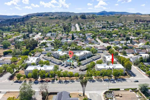 an aerial view of a city with lots of residential buildings
