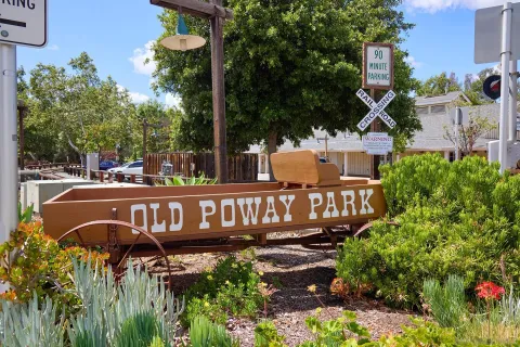 a view of street sign of a garden