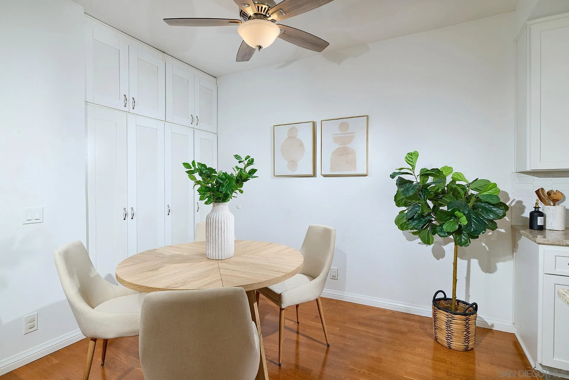 13826 Midland Road Poway, CA 92064 - Photo 8 of 38 a view of a dining room with furniture and a potted plant
