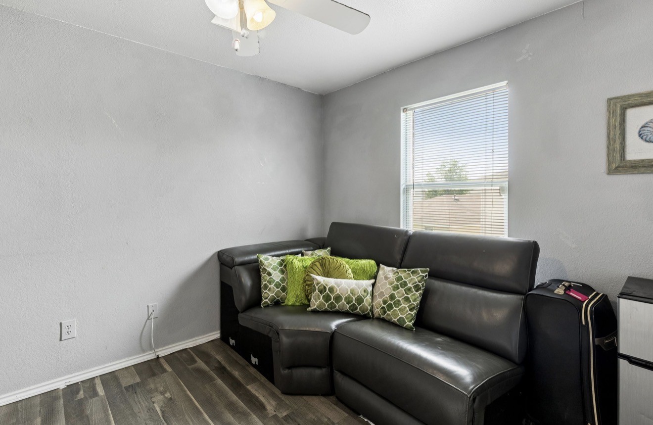 7118 Rising Brook Drive Cypress, TX 77433 - Photo 16 of 21 a living room with furniture and a window