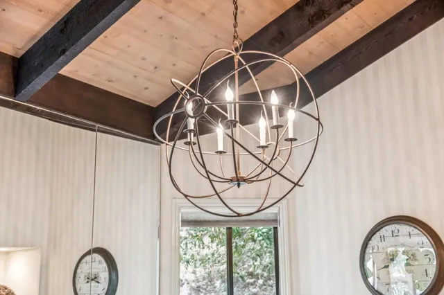 a picture of a glass door with a fan