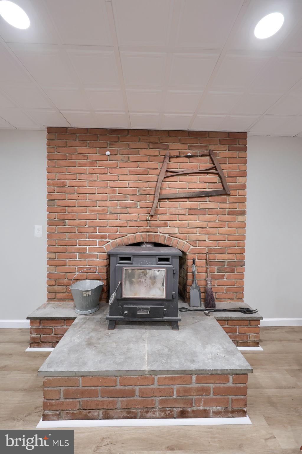 3356 Turnpike Road Elizabethtown, PA 17022 - Photo 31 of 52 Cozy brick fireplace with rustic charm.