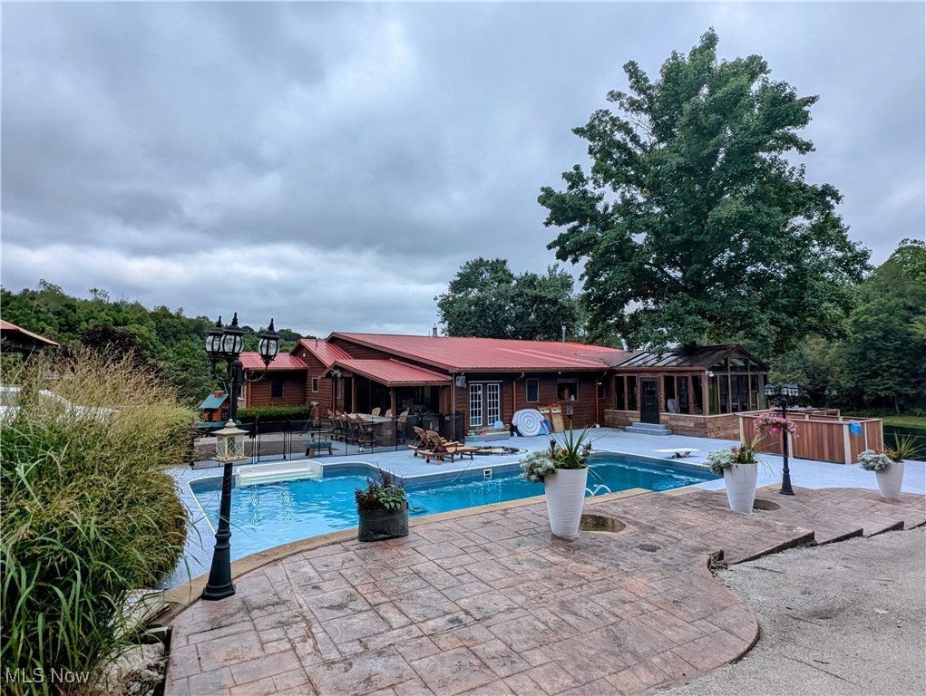 46136 Carlisle Road Lisbon, OH 44432 - Photo 12 of 48 View of pool with a patio