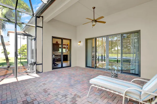 a house view with a sitting space and garden