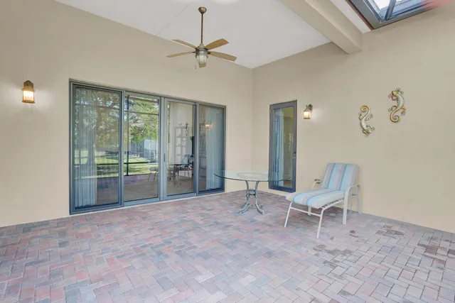 a view of a lake with houses in the back