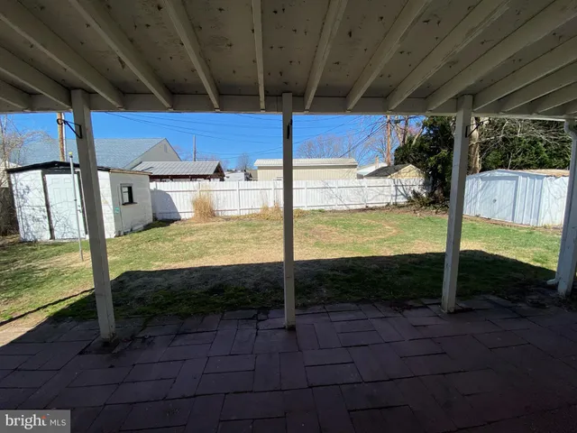 a view of a backyard of a house