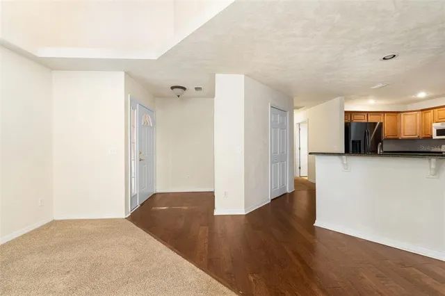 a view of a livingroom with wooden floor