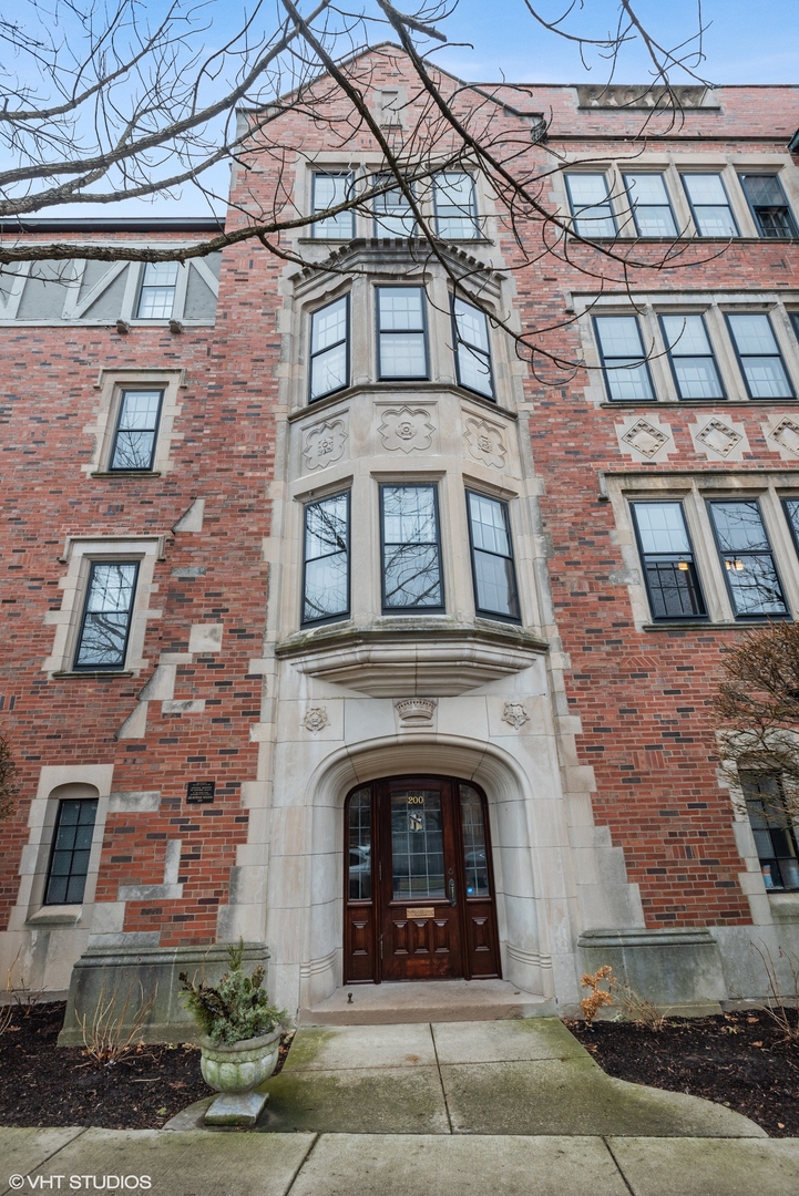 200 Lee Street, Unit 1B Evanston, IL 60202 - Photo 2 of 26 a building with a window and balcony