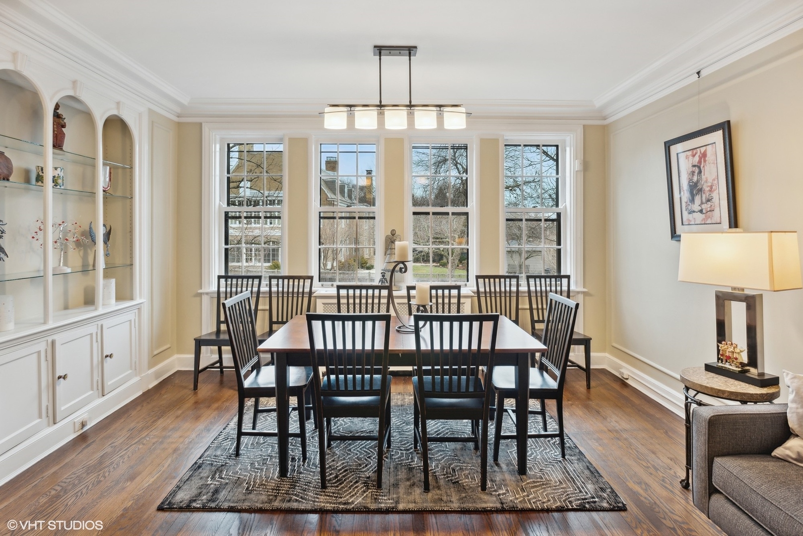 200 Lee Street, Unit 1B Evanston, IL 60202 - Photo 6 of 26 a view of a dining room with furniture window and wooden floor