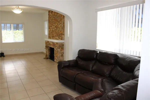 a bathroom with a shower a toilet and a shower