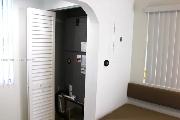 a blue sign that is on the side of a road