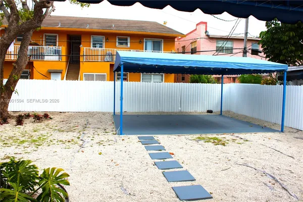 a front view of house with a yard