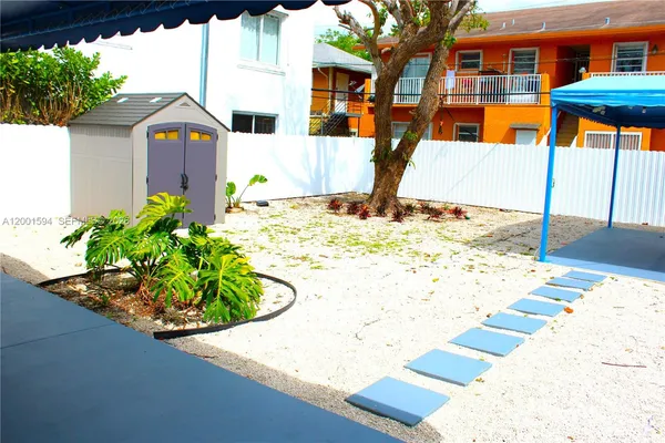 a view of a house with a patio
