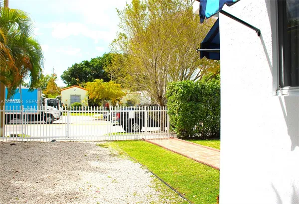 a view of room window and wooden floor