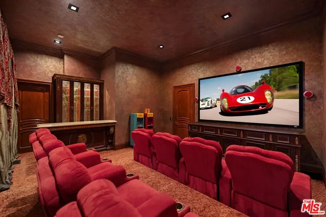 a bathroom with a mirror and a sink