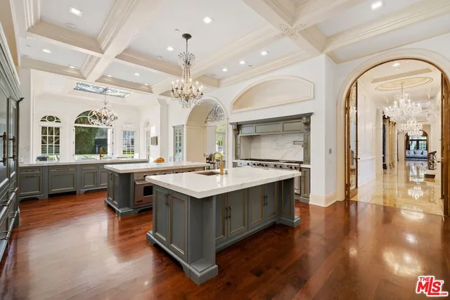a view of lobby with a sink and wooden floor