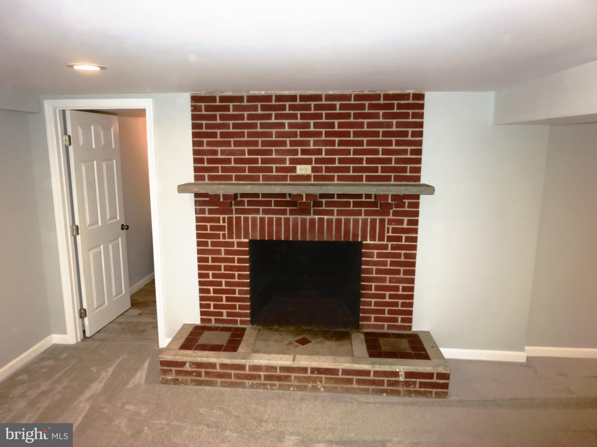 2403 Sandymount Road Finksburg, MD 21048 - Photo 20 of 29 Finished basement w/fireplace
