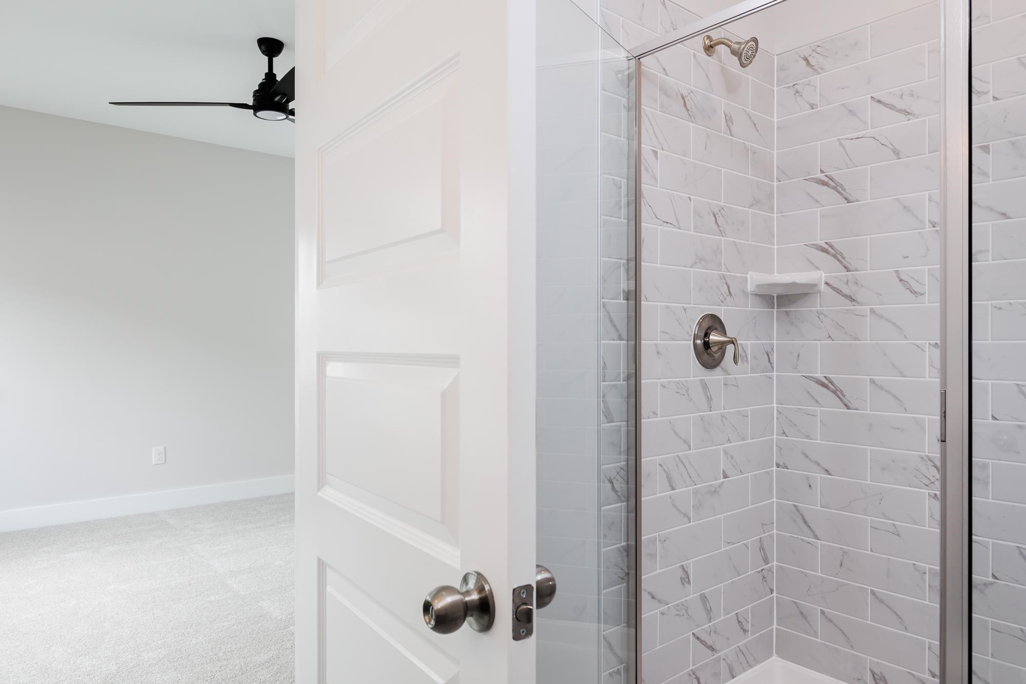 8222 Ebenezer Church Road Raleigh, NC 27613 - Photo 11 of 18 a bathroom with a shower