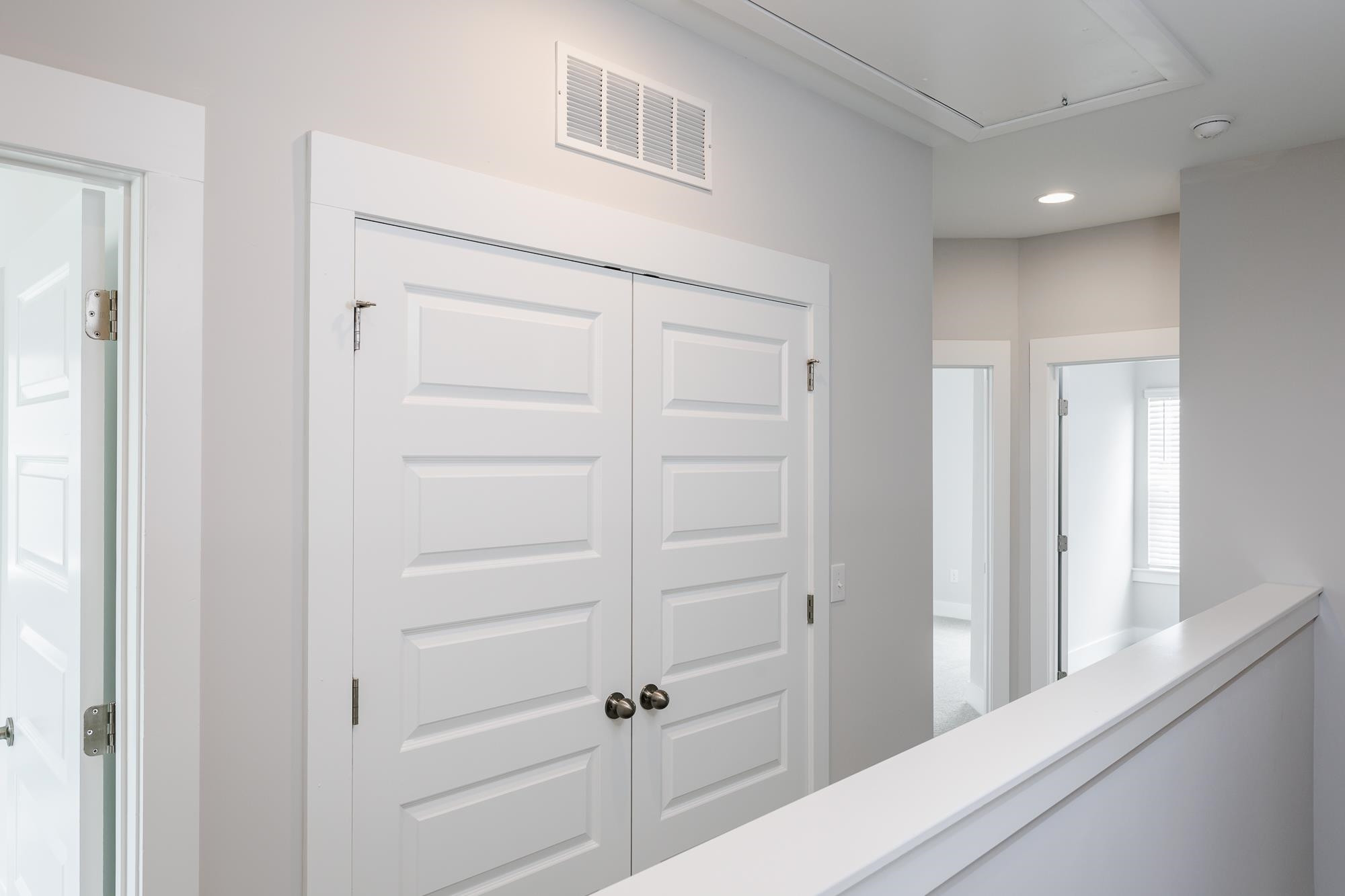 8222 Ebenezer Church Road Raleigh, NC 27613 - Photo 12 of 18 a view of a hallway with closet