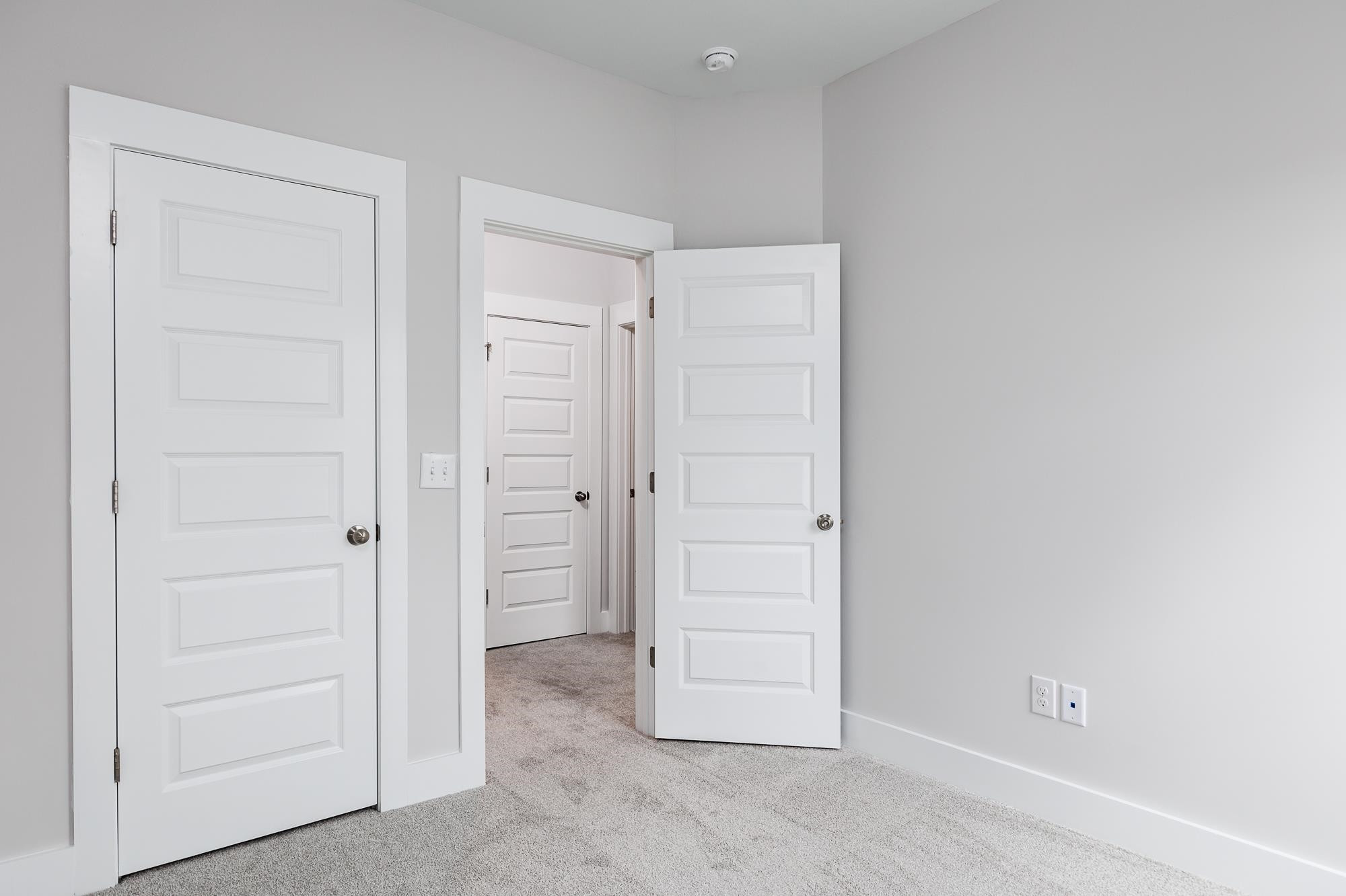 8222 Ebenezer Church Road Raleigh, NC 27613 - Photo 15 of 18 an empty room with closet area