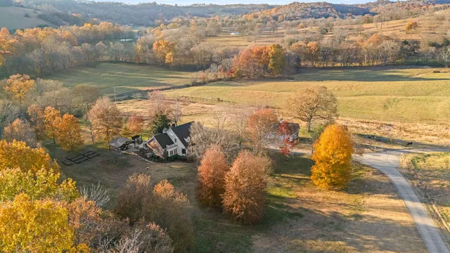 a kitchen with stainless steel appliances a stove a sink refrigerator and cabinets