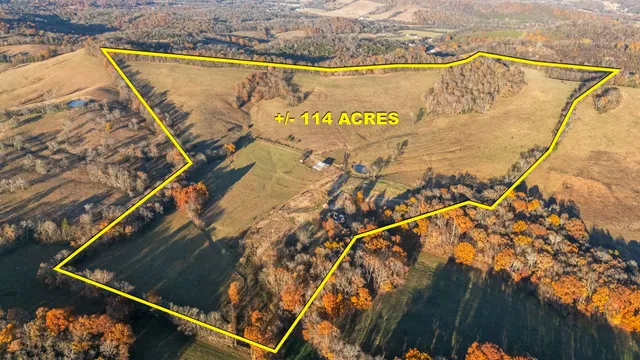 a kitchen with stainless steel appliances granite countertop a sink stove and microwave