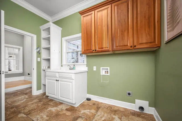 a view of a patio with table and chairs and wooden floor