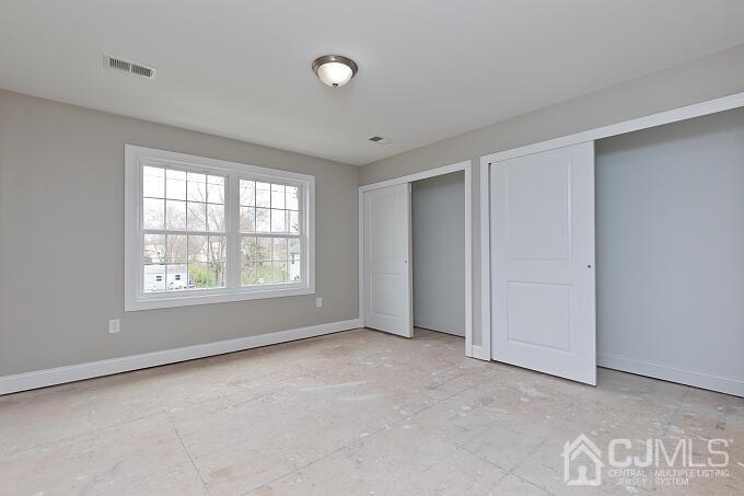 1214 Brookside Road Piscataway, NJ 08854 - Photo 19 of 26 a view of an empty room with a window