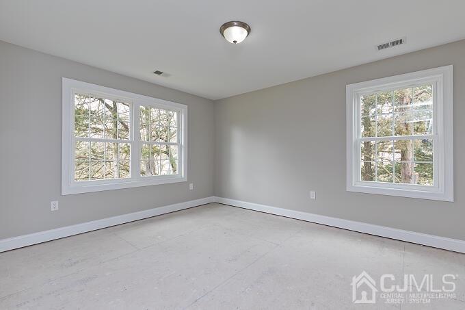 1214 Brookside Road Piscataway, NJ 08854 - Photo 20 of 26 a view of an empty room with a window