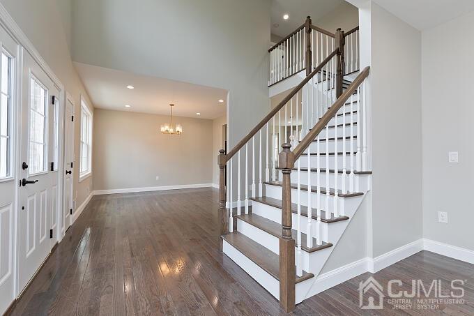 1214 Brookside Road Piscataway, NJ 08854 - Photo 3 of 26 a view of entryway with stairs and wooden floor