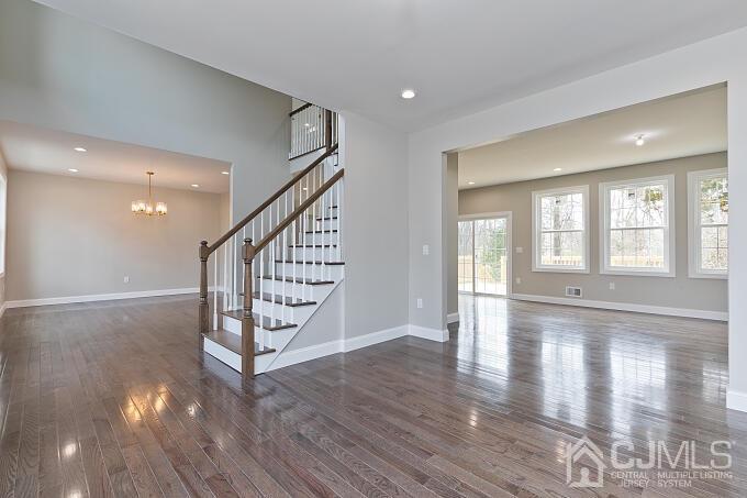 1214 Brookside Road Piscataway, NJ 08854 - Photo 4 of 26 a view of an entryway with wooden floor