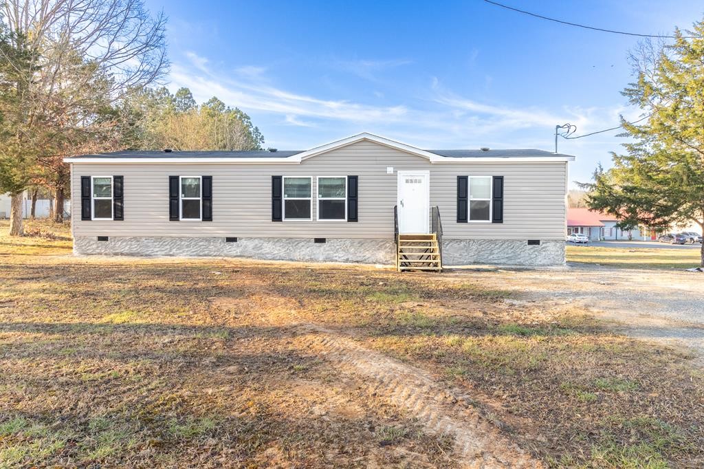 1944 Red Cut Road Chatsworth, GA 30705 - Photo 1 of 17 a view of a yard of the house
