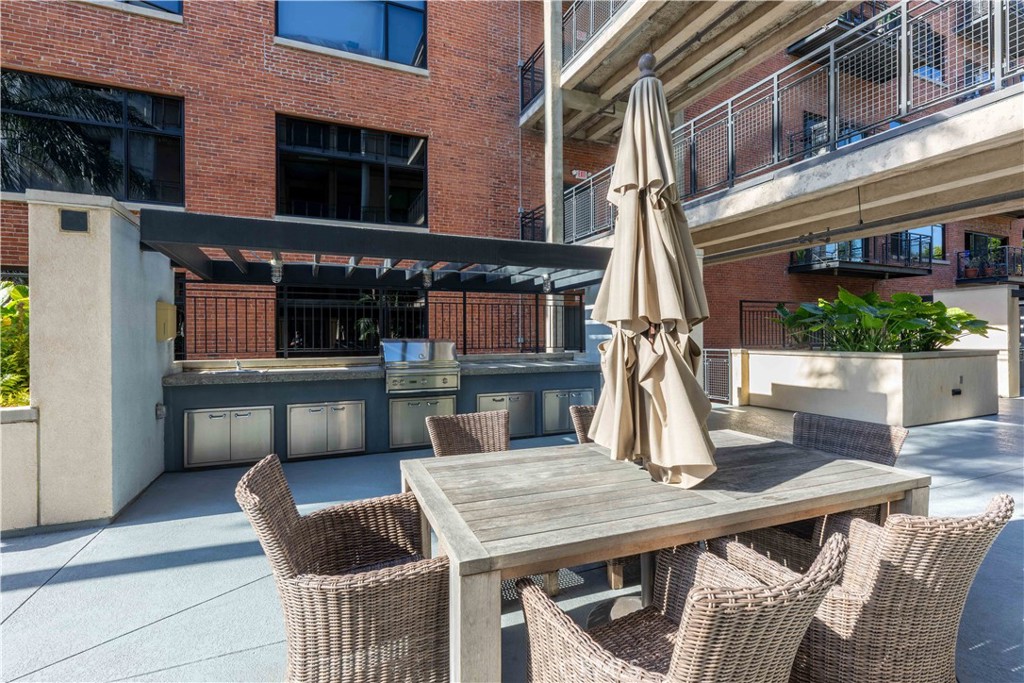 835 Locust Avenue, Unit 419 Long Beach, CA 90813 - Photo 41 of 51 Grills and dining in community area