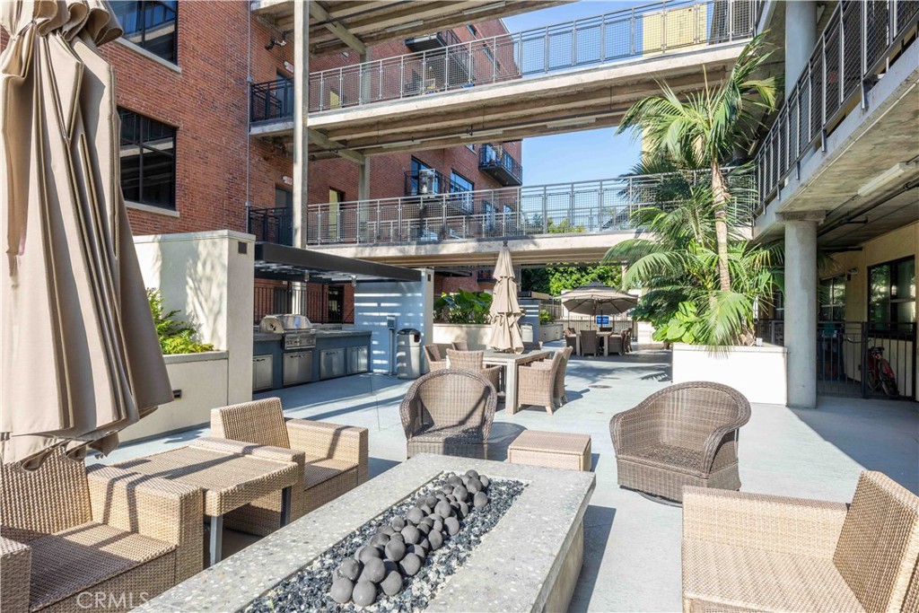 835 Locust Avenue, Unit 419 Long Beach, CA 90813 - Photo 42 of 51 Seating and fire pit