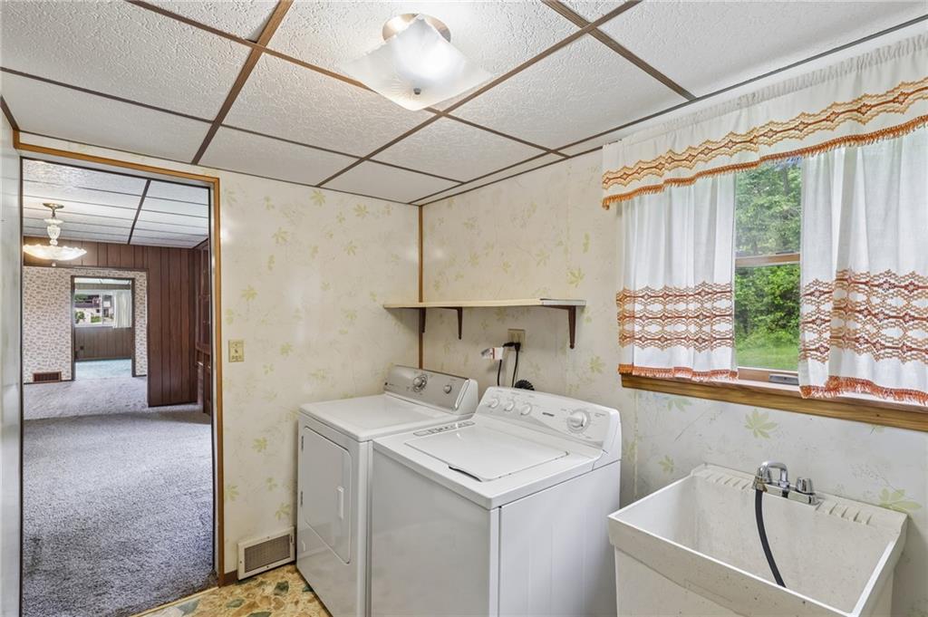 316 Orr Avenue Apollo, PA 15613 - Photo 15 of 47 a utility room with a sink and cabinets
