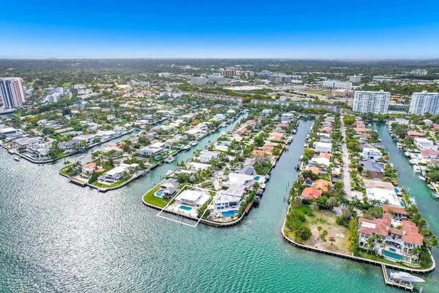 an aerial view of a house with a garden