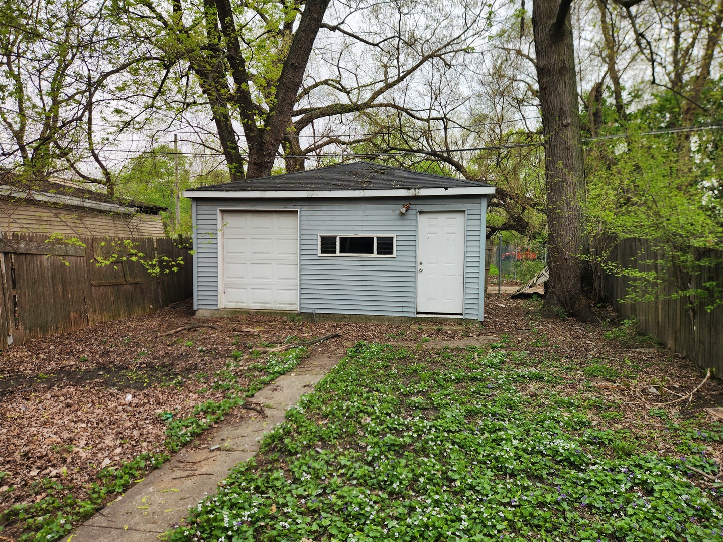 5242 South Sangamon Street Chicago, IL 60609 - Photo 14 of 14 a house is sitting in middle of forest