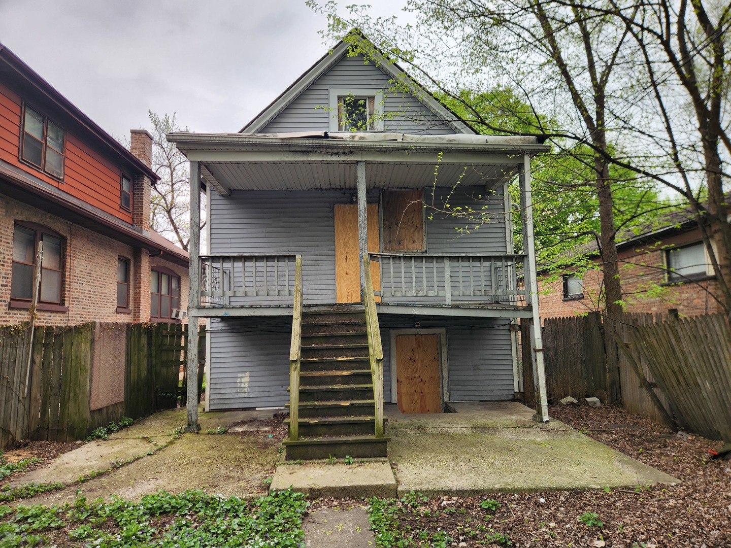 5242 South Sangamon Street Chicago, IL 60609 - Photo 2 of 14 a front view of a house with a garage