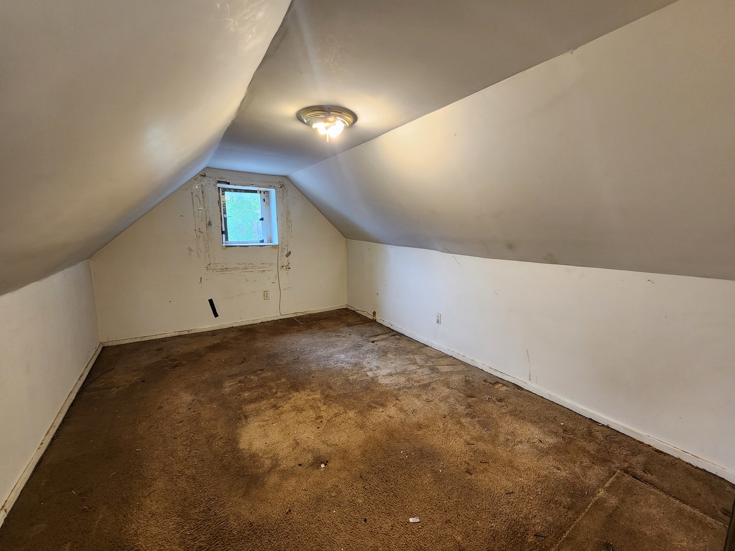 5242 South Sangamon Street Chicago, IL 60609 - Photo 10 of 14 an empty room with a empty space and windows