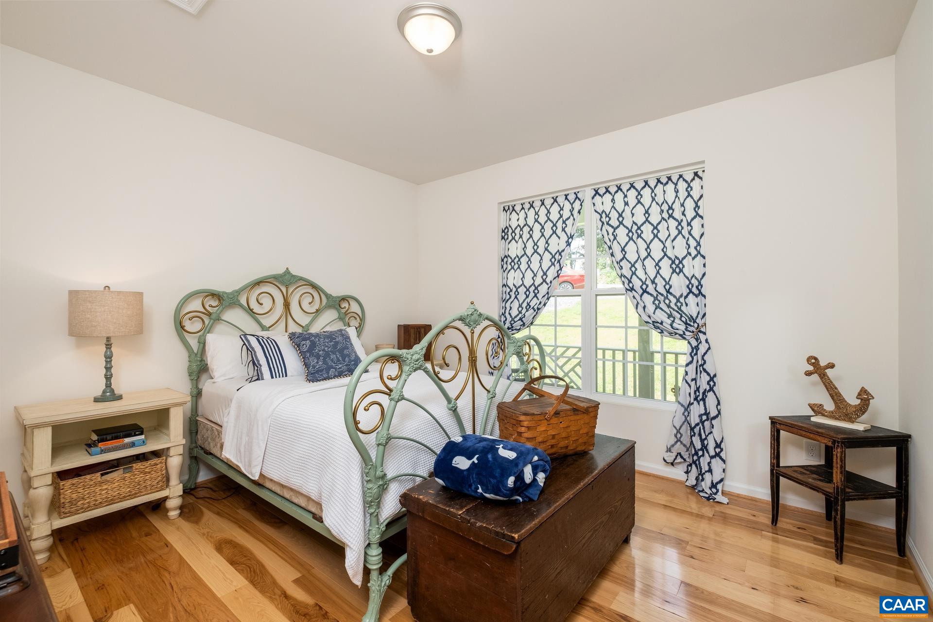 283 Logtrac Road Stanardsville, VA 22973 - Photo 17 of 49 a bedroom with bed and a window
