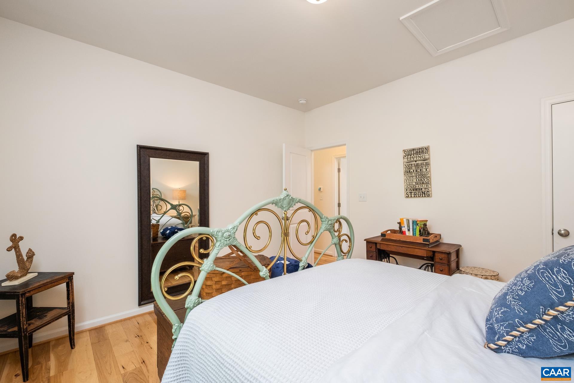 283 Logtrac Road Stanardsville, VA 22973 - Photo 18 of 49 a bedroom with bed and a chair