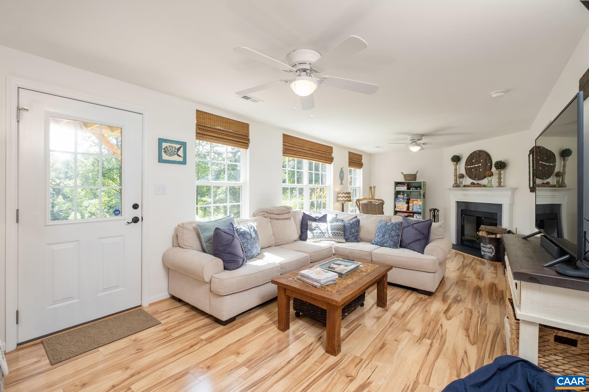 283 Logtrac Road Stanardsville, VA 22973 - Photo 21 of 49 a living room with furniture and a fireplace
