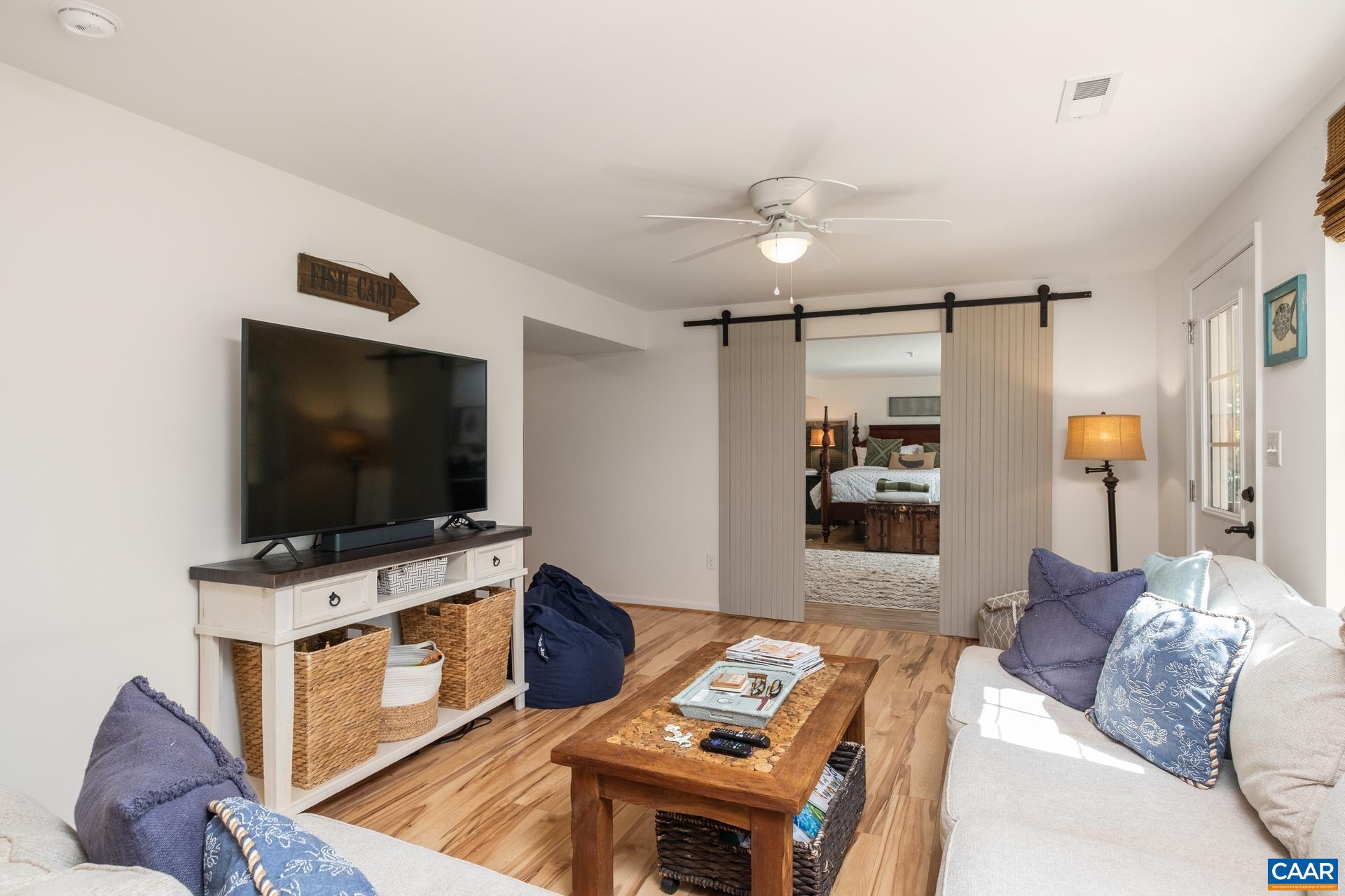 283 Logtrac Road Stanardsville, VA 22973 - Photo 23 of 49 a living room with furniture and a flat screen tv